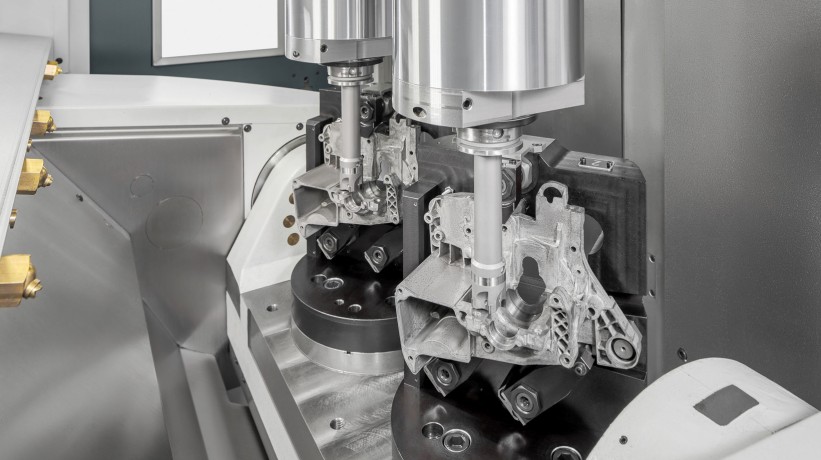  ...with integrated 180° swivel table and two working areas – for machining in two clamping positions and for loading and unloading during machining ... 