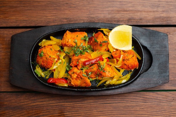  Another dish popular the world over is tandoori chicken, which is marinated for hours in yogurt and rich spices and – in traditional cuisine – cooked in a clay oven called a tandoor. Image: Pixabay, ArtificialOG 